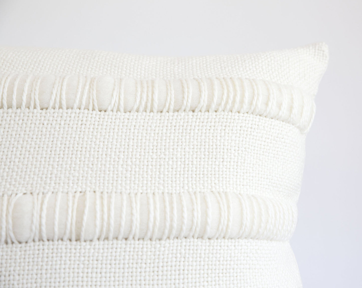 Cushion case corner of roving texture stripes and hanweaving textil - Close shot - 