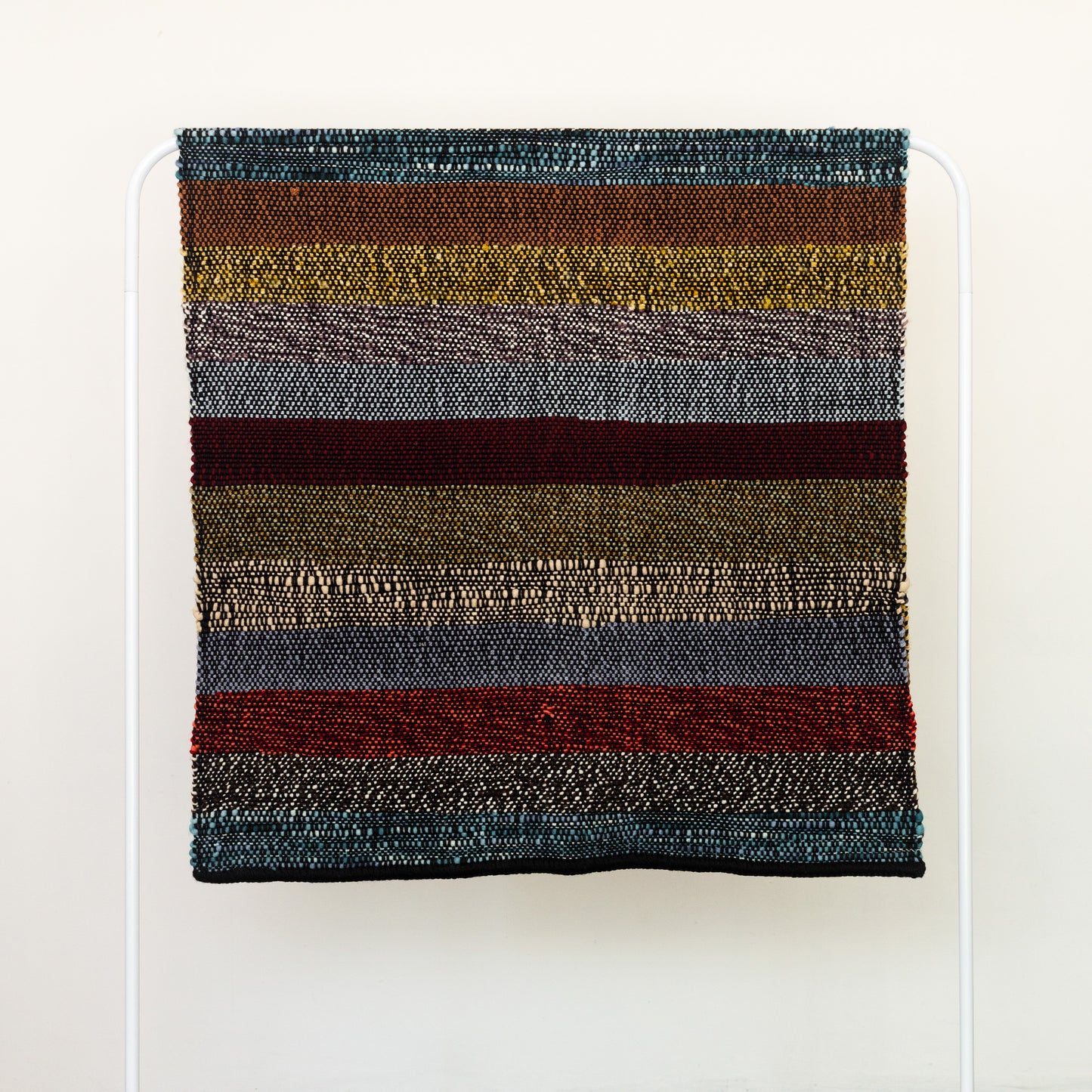 Black Merino Wool Throw with Bold Multicolor Stripes – Handwoven & Unique