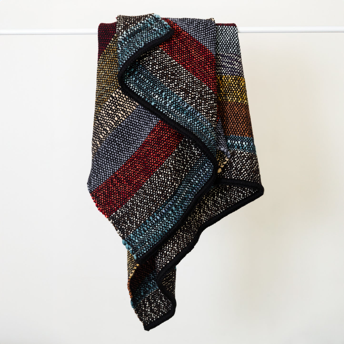 Black Merino Wool Throw with Bold Multicolor Stripes – Handwoven & Unique