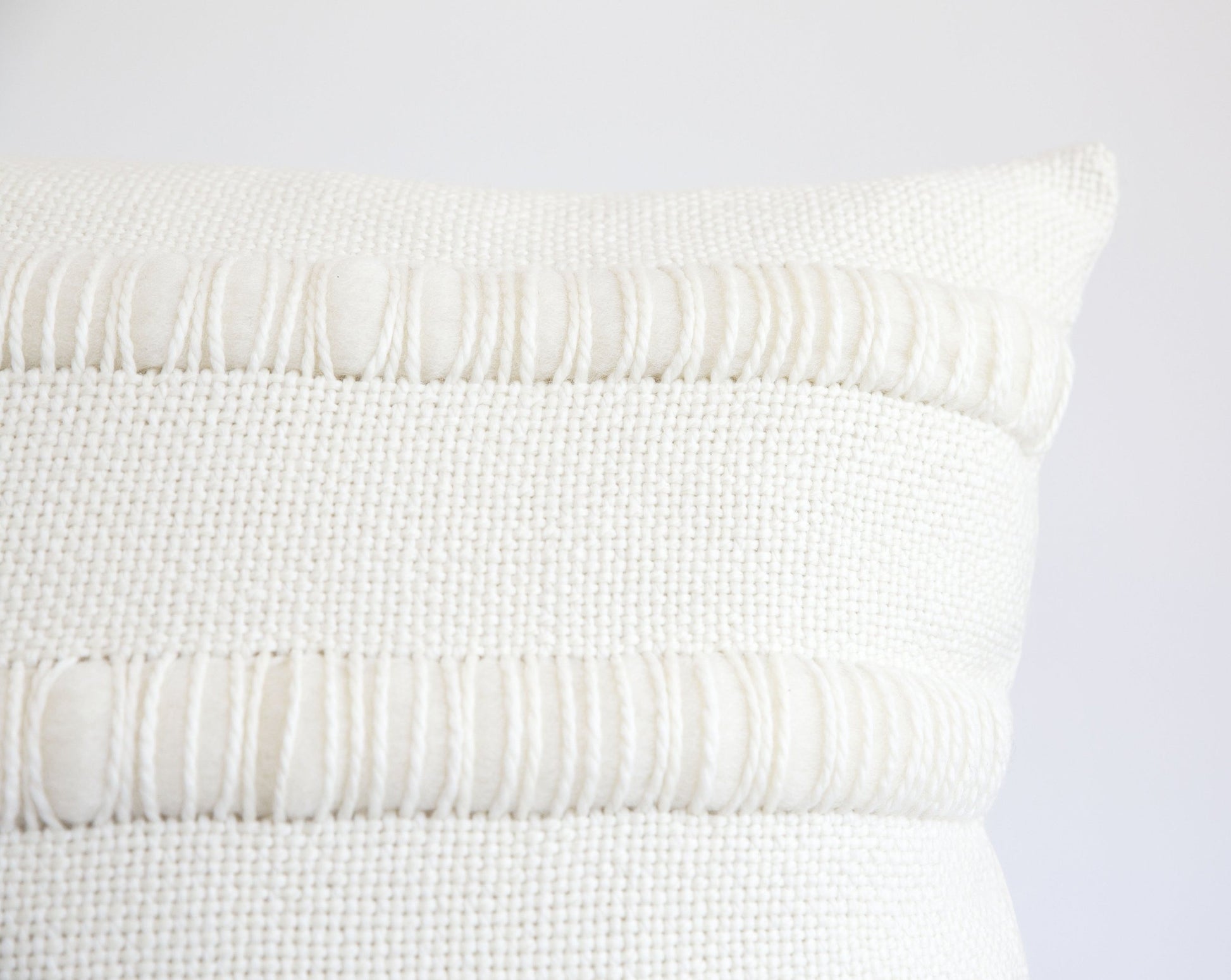 Cushion case corner of roving texture stripes and hanweaving textil - Close shot - 